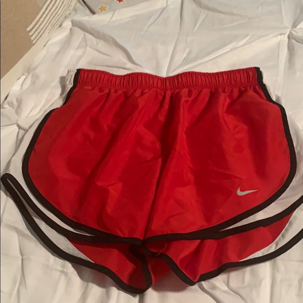 Red nike shorts